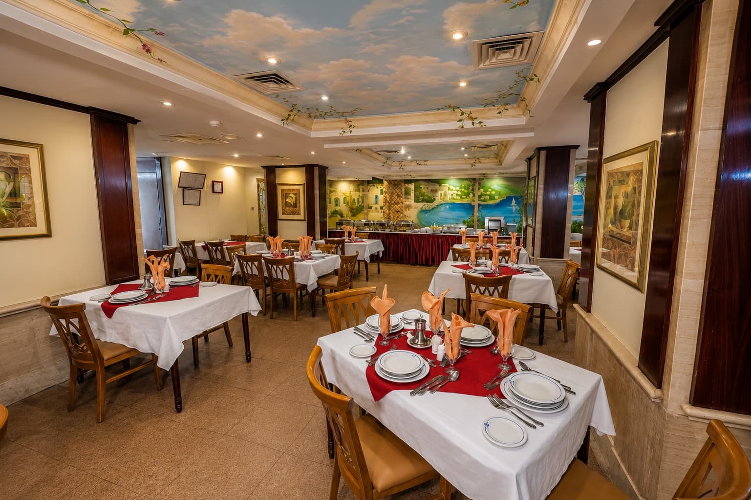 Nile Pavilion Restaurant — elegant table settings and warm lighting